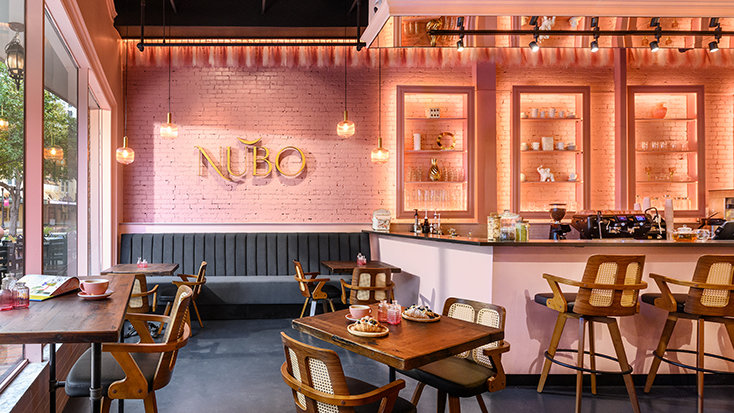 The completed Nubo interior brings new color, warmth and activity to the district, transforming the 420 Cleveland Street storefront into a Ukrainian café, bakery and coffee destination.