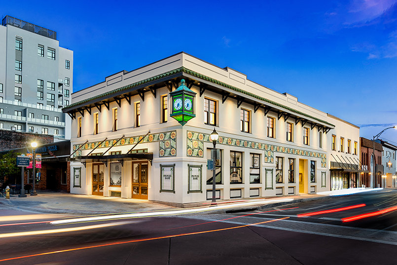 Originally built in 1910 and transformed during the 1920s into a Mediterranean Revival landmark, the Peoples Bank Building has been meticulously restored—from its colorful terra-cotta façade and historic storefront to the return of its iconic four-faced clock.